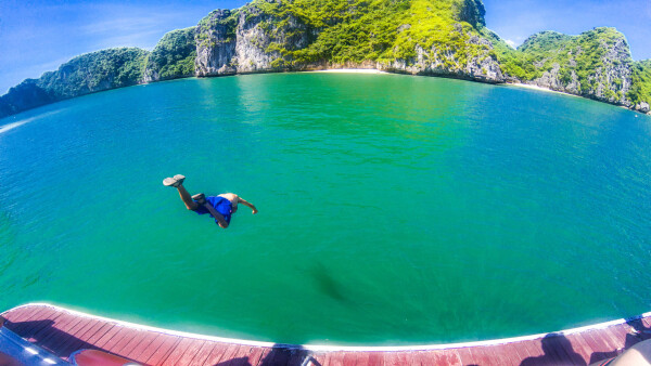 Man jumping into Halong Bay