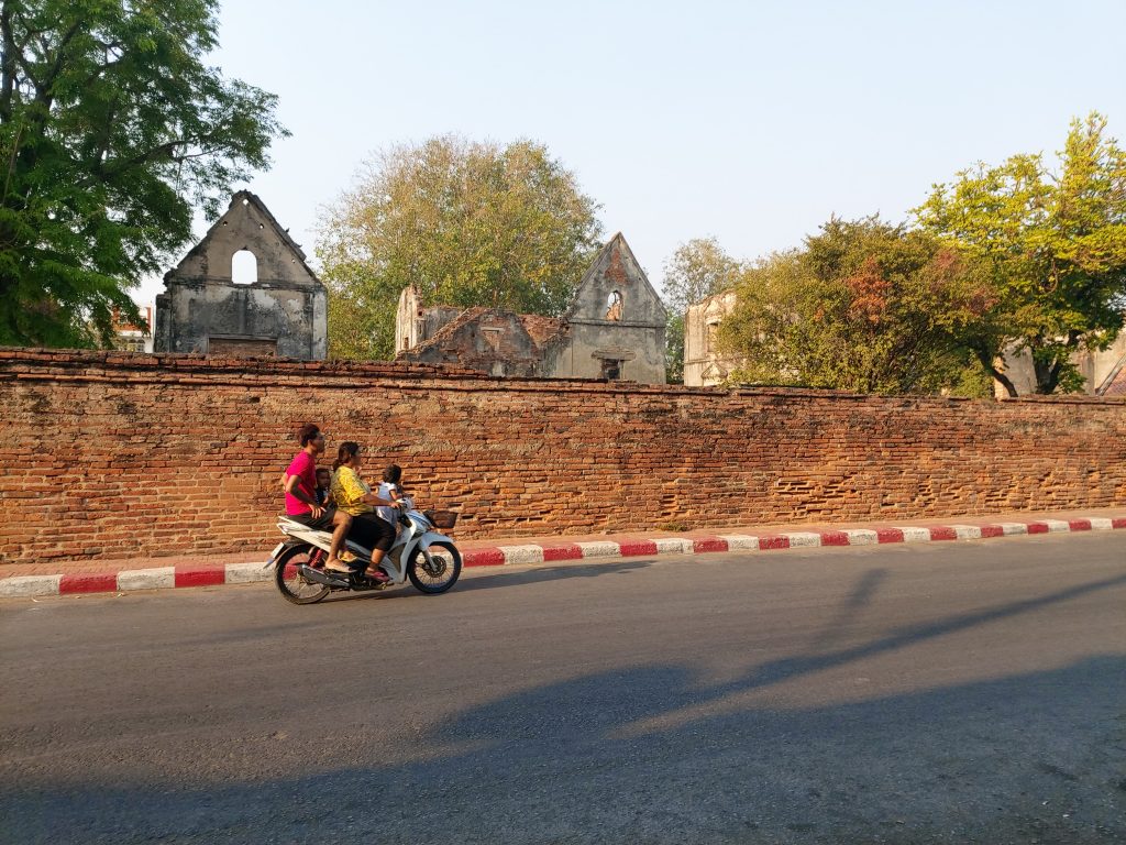 Riding a scooter in Thailand