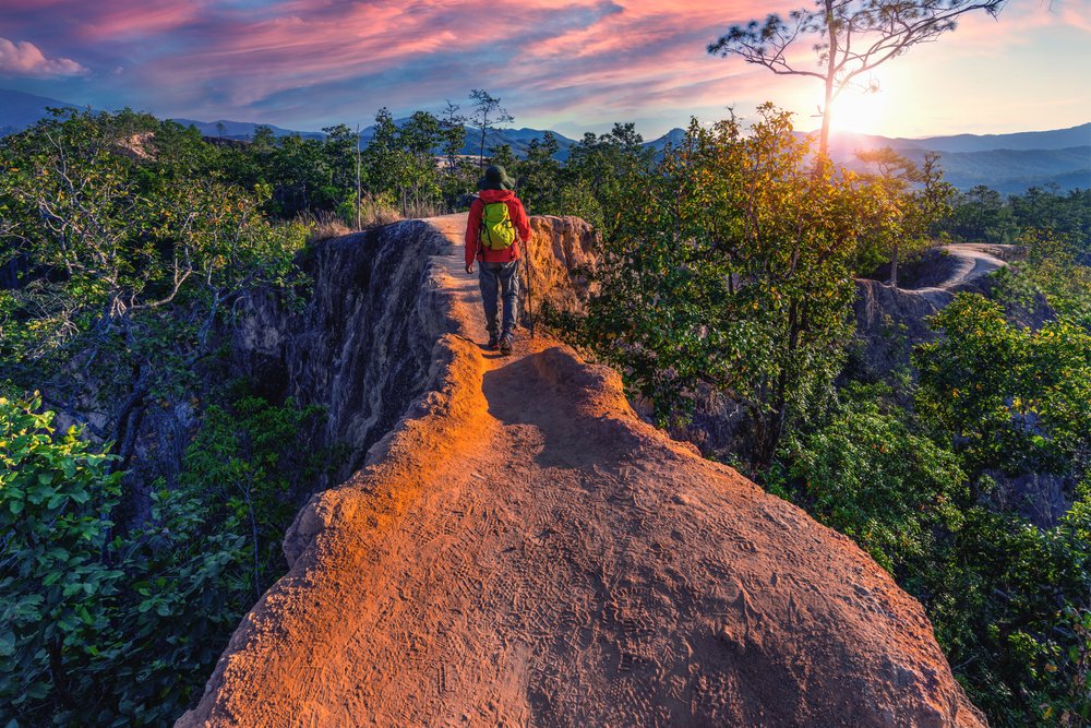 Person walking on Pai Canyon in Thailand