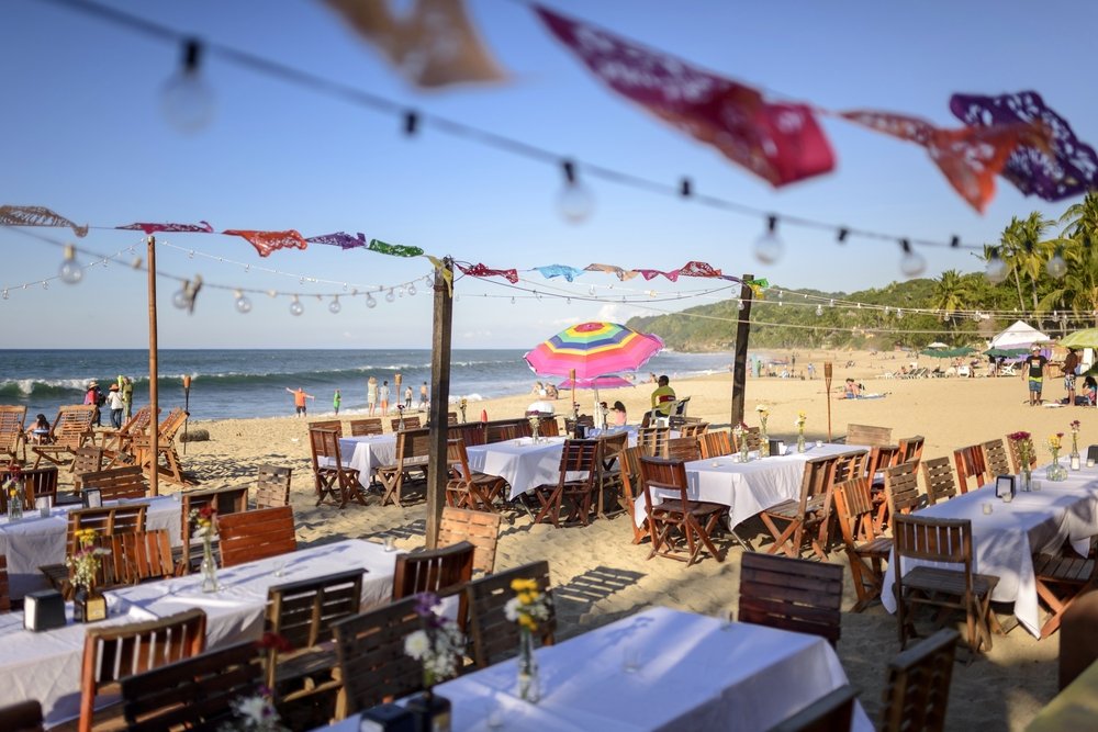 tables on the beach in the beach town of Sayulita, Mexico