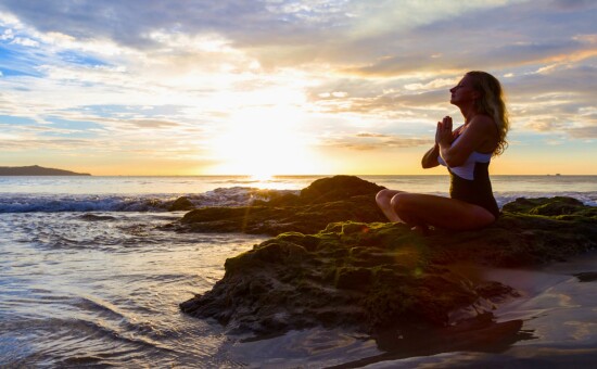 Woman doing yoga in Costa Rica feature