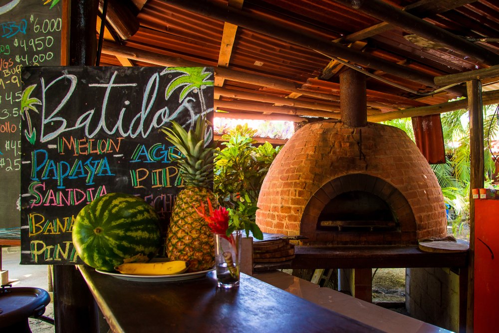 Costa Rican restauarant with pizza oven and drinks menu