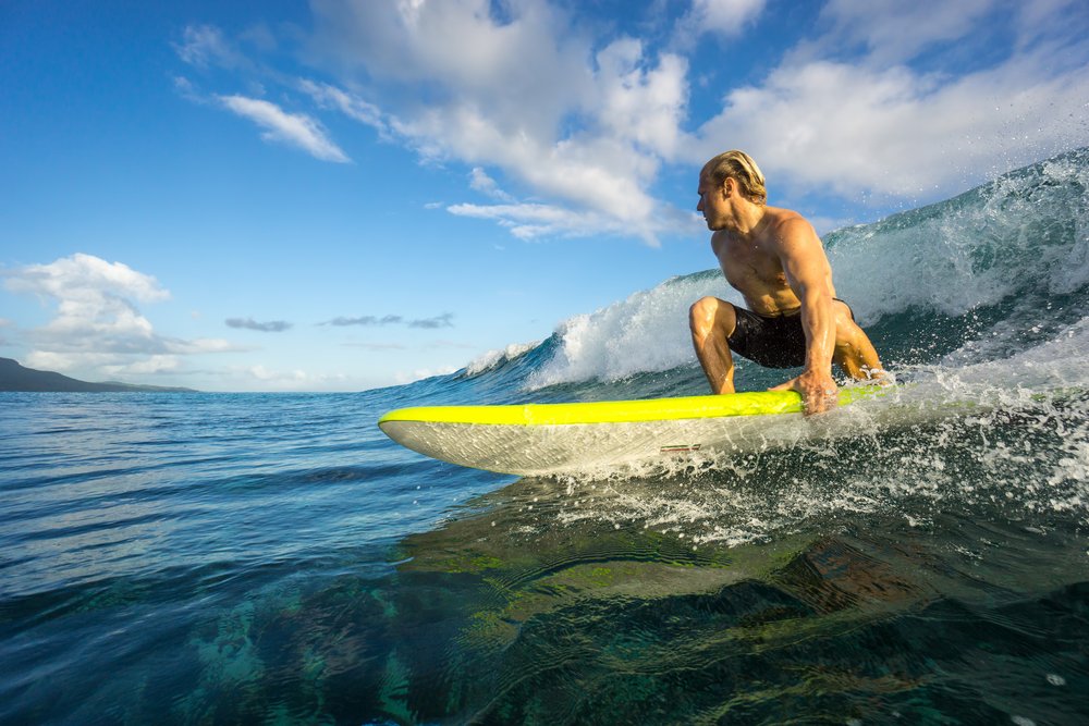 Dude surfing in Costa Rica