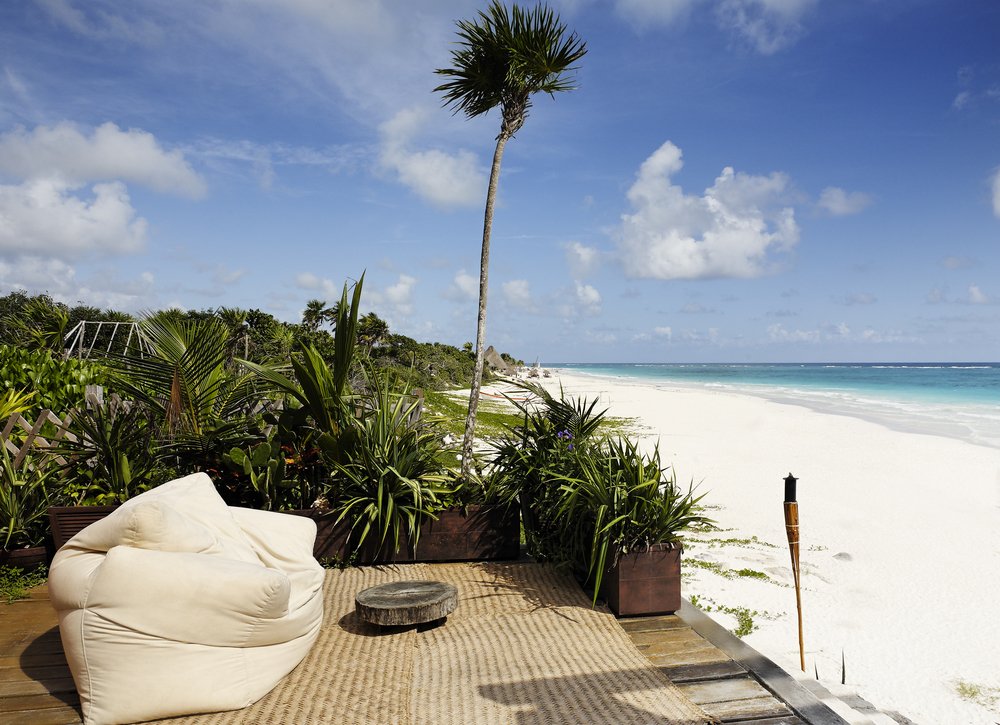 white bean bag chair on Tulum Beach Mexico