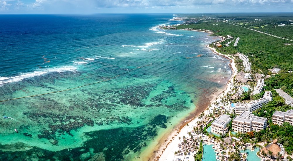 drone view of Playa Akumal coastline