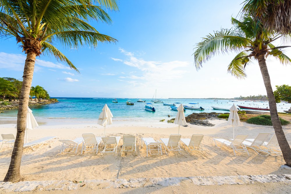 white loungers and umbrellas in Playa Akumal