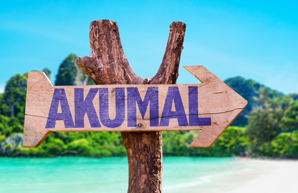 arrow sign that reads Akumal