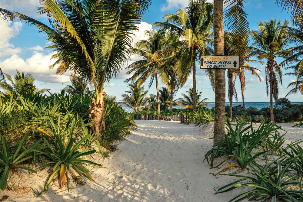 Sandy path to Santa Fe Beach in Tulum Mexico