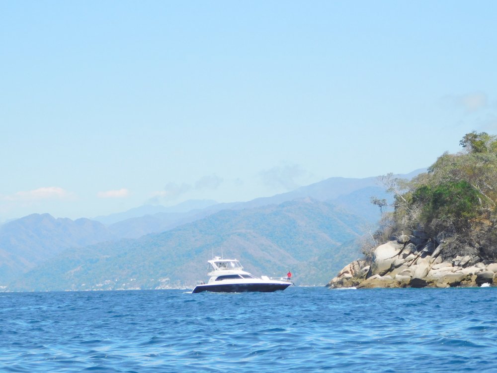 ship in the water near Quimixto