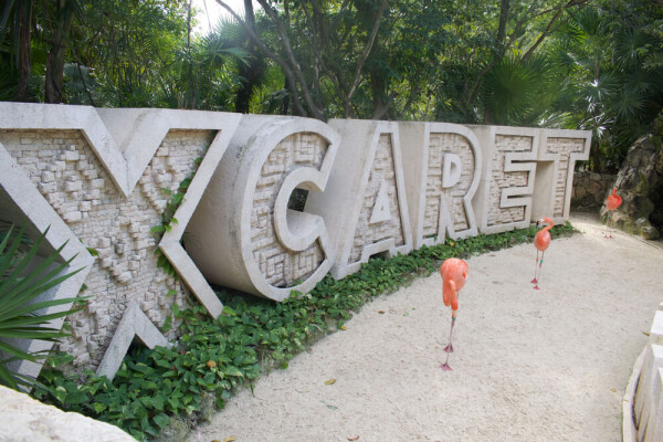 Xcaret Park sign wih flamingos