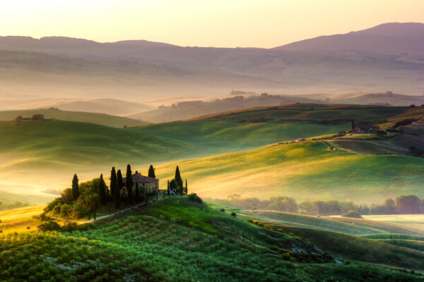 sunrise over rolling hills of Tuscany